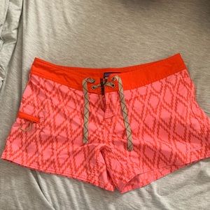 pink and orange Patagonia shorts
